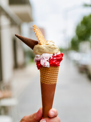 Hand Holding Italian Ice Cream 