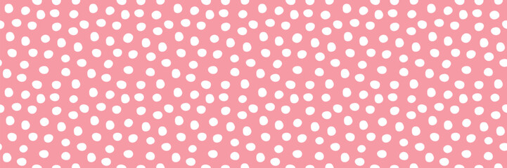 White polka dot seamless pattern on pink background, minimalist design