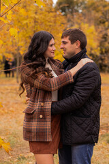Loving couple enjoying a peaceful autumn walk. autumn mood, autumn concept, fall