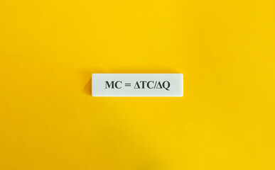 Marginal Cost Formula on White Tile with Yellow Background