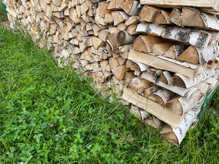 A Stack of wooden firewood closeup