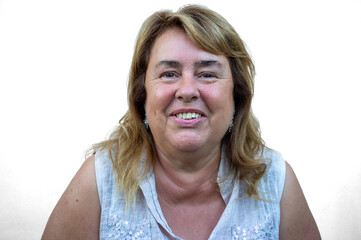 Real smiling mature woman portrait on neutral background