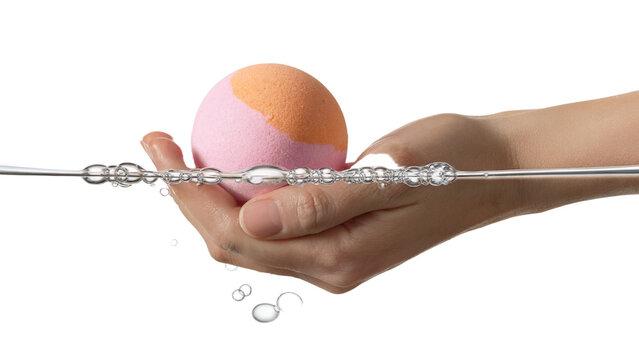 Hand Holding Bath Bomb with Water Splash png isolated cutout background