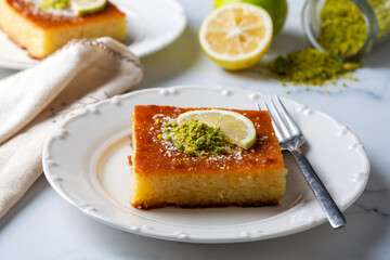 Revani - sweet semolina cake with pistachio, traditional turkish dessert