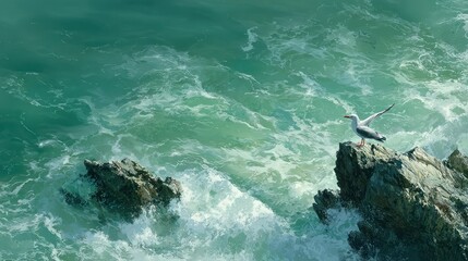 A seagull perched on a rocky cliffside overlooking a churning turquoise ocean