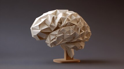 Crumpled paper origami in the form of a brain on a dark background
