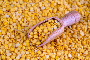 Yellow lentil on the white background
