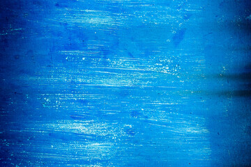 Blue paint grunge wall texture abstract white pattern cold background spot light backdrop vignette