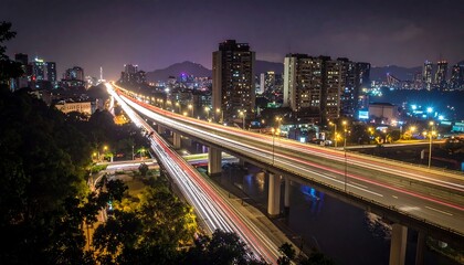 Fototapeta premium Night cityscape with a highway overpass
