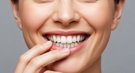 Obraz premium woman's smile, perfectly straight, white teeth. Image represents fantastic results of professional dental care, teeth whitening, oral hygiene. concept for stomatology and cosmetic dentistry.