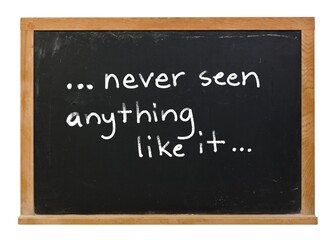 Never seen anything like it written in white chalk on a black chalkboard in a wooden frame