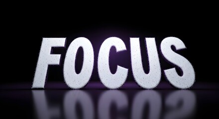 word "FOCUS" with a glowing light on a dark, reflective surface