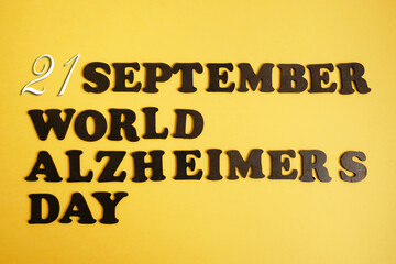 chalk board with inscription september 21 alzheimer's day, brain disease concept