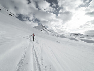 Ski tourers making a track in the French Alps