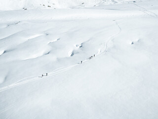 Group of ski tourers crossing the Argentiere glacier in France