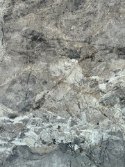 Granite texture with abstract mineral surface and veins. High resolution granite surface with abstract mineral patterns and subtle veins. Perfect for use in architectural projects, backgrounds,