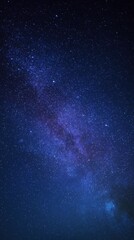 Fototapeta premium A breathtaking view of the milky way galaxy stretching across the dark night sky, filled with countless stars and nebulae, evoking a sense of wonder and the vastness of the universe