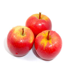 Fresh red apples together on white background close up view