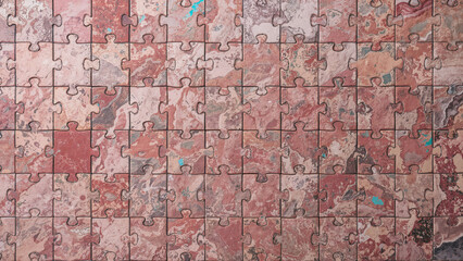 Fototapeta premium Intricate puzzle reveals intricate patterns and earthy colors in a calm indoor environment