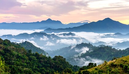 Obraz premium Misty mountain range at dawn