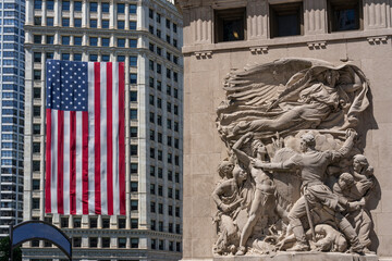 Chicago skyscraper with American flag on it 