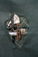 old rusty lock on a fence 