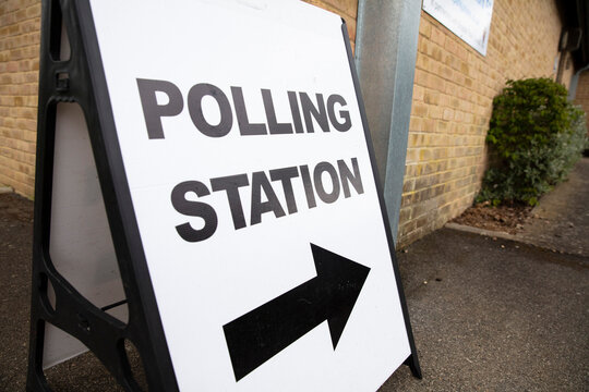 Polling station sign outside the entrance to a political voting location in UK