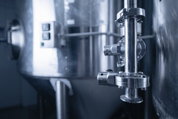 Industrial brewery equipment, modern stainless steel beer production facility interior