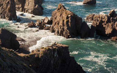 waves crashing on rocks