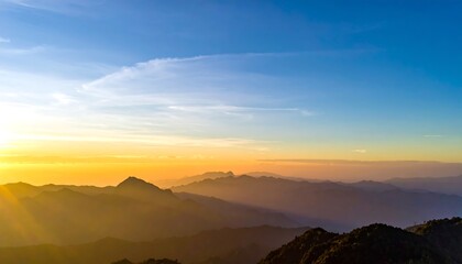 Obraz premium Sunrise over mountain ranges