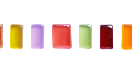 A vibrant row of colorful translucent sugar-coated rectangular fruit jelly candies.