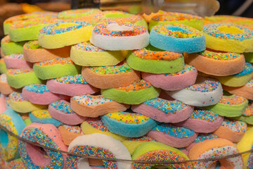 Grand Bazaar market in Istanbul Turkey. Big tourist market in Asia, people crowd moving in narrow corridor where goods food and souvenirs are sold. Turkish delight sweet