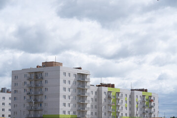 The ongoing development of modern buildings at the construction site is a vital task in progress. A construction site showcasing the ongoing development of modern residential buildings and facilities