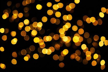 Golden bokeh lights against a black background