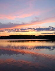 Serene sunset over a still lake