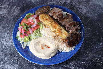 Halal Mix Grill with Rice, Hummus, and Salad &ndash; Middle Eastern Platter