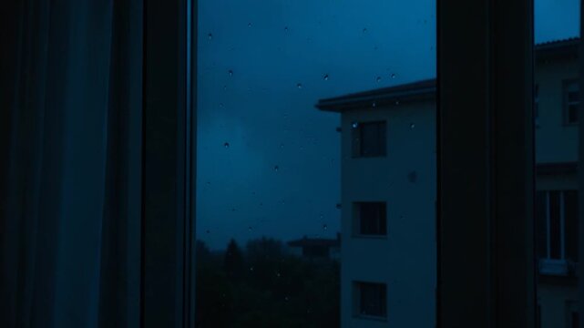 Night rain with lightning, outside view of apartment house with closed windows