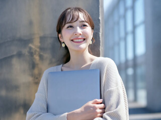 ノートパソコンを持った女性 Generative AI