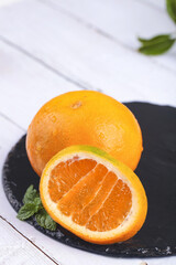 Fresh Orange Citrus Fruit with Jelly Pulp on Black Slate - Ehime Produce