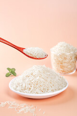 Premium White Basmati Rice Grains on Plate with Wooden Spoon Food Photography