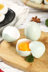 Fresh Large White Duck Eggs with Raw Yolk on Wooden Board - Organic Farm Eggs
