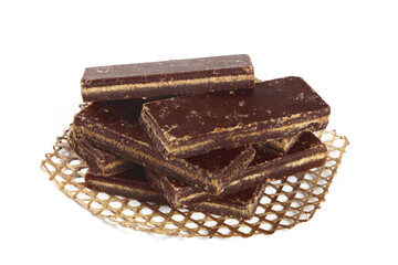 Chocolate Wafer Bars with Layered Filling in Wire Basket on White Background