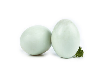 Fresh Duck Eggs with Herb Garnish on White Background