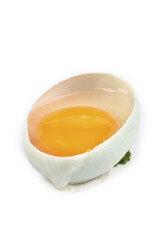 Fresh Duck Egg with Golden Yolk Cracked Open on White Background
