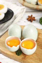 Fresh Duck Eggs with Golden Yolks on Wooden Board - Natural Farm Ingredients for Cooking