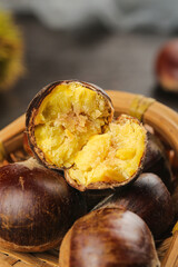 Fresh Roasted Qianxi Chestnuts with Golden Yellow Flesh in Wooden Basket
