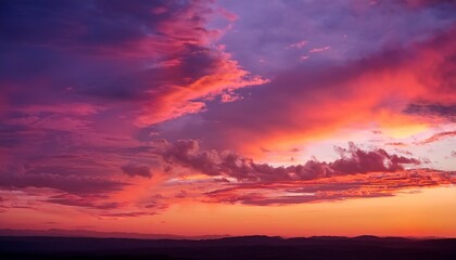 Fototapeta premium A Beautiful Sky With A Pink And Orange Sunset