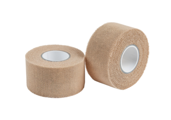 Two rolls of light beige athletic tape.  Close-up, showing the wound-around structure and a white center core