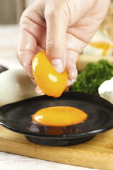 Fresh Farm Egg Being Cracked Into Pan - Natural Cooking Preparation