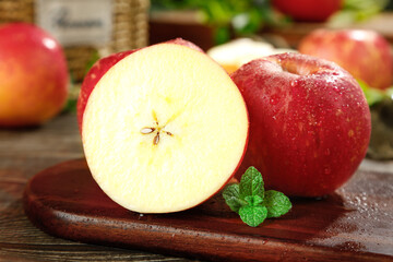 Fresh Red Apples with Water Droplets on Rustic Wooden Board - Healthy Organic Fruit